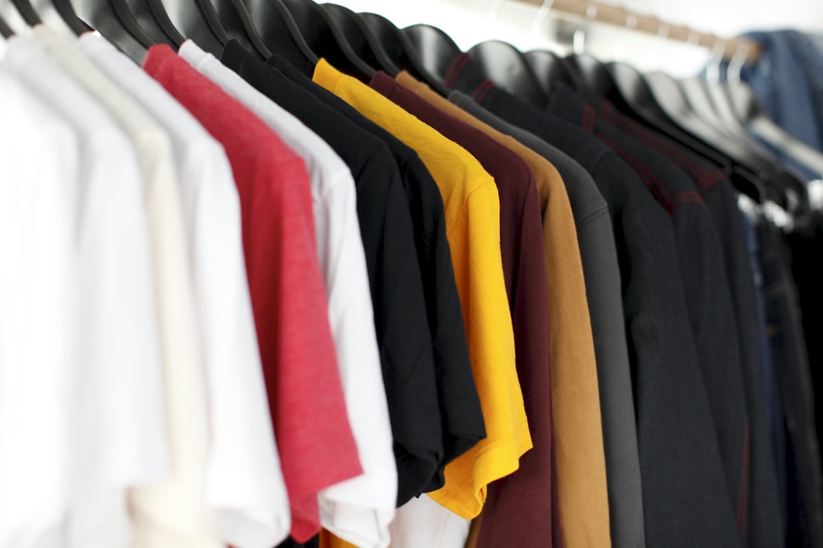 A rack of clothing in a studio — dropshipping clothing and apparel