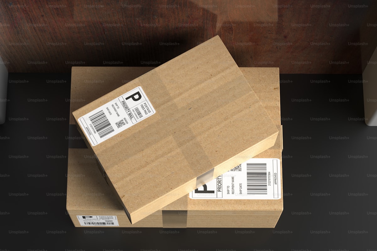 Hands unboxing a product sample at a desk — dropshipping product research